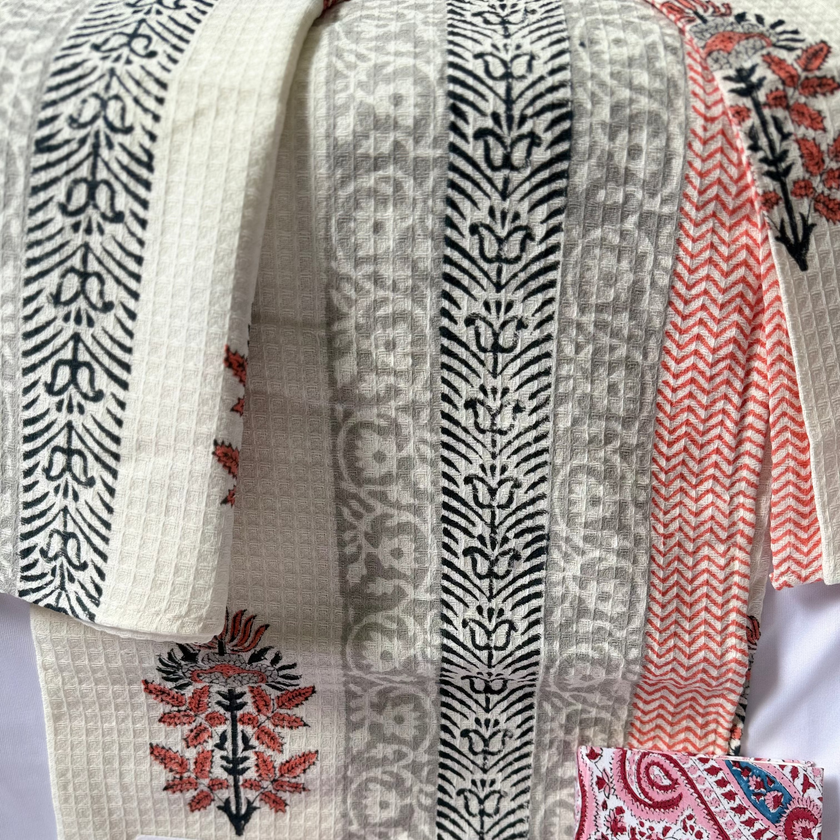 Collection of patterned scarves on a white background