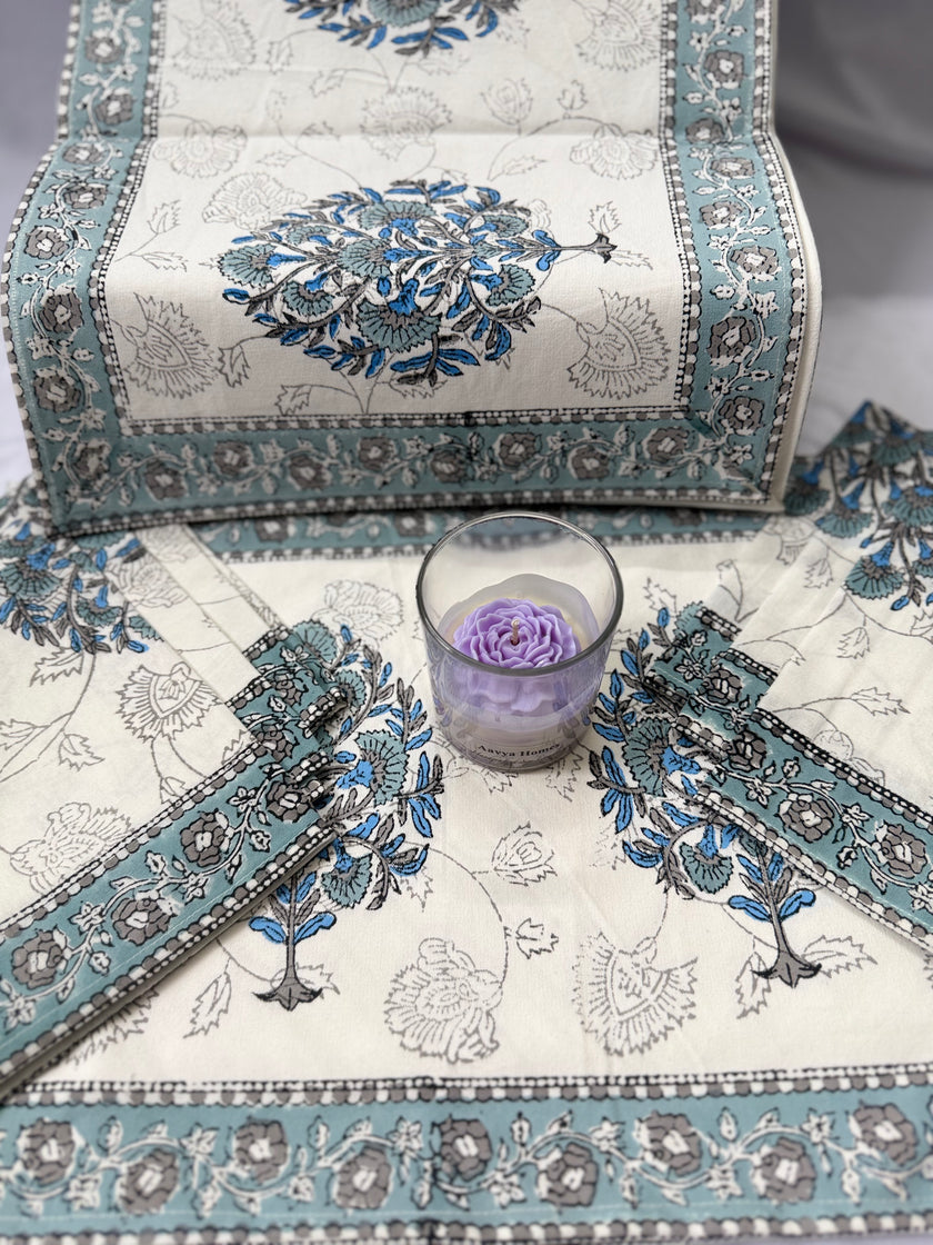 Off white with blue floral patterns table runner with mats and napkins
