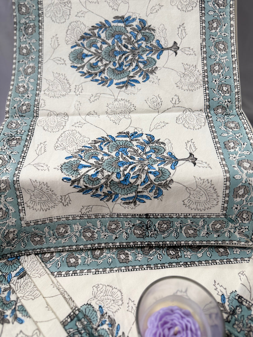 Off white with blue floral patterns table runner with mats and napkins