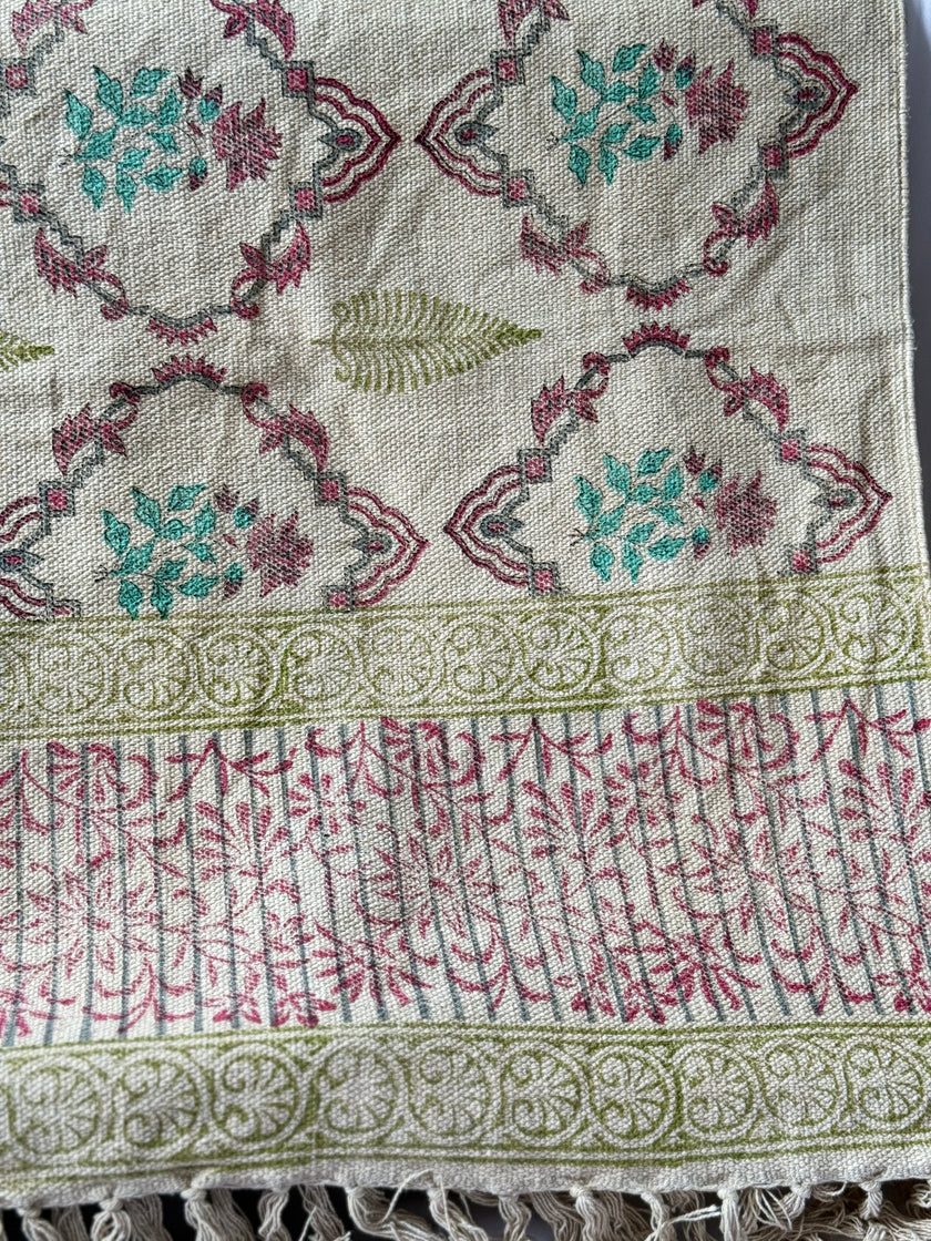 Textile with intricate patterns and designs on a neutral background